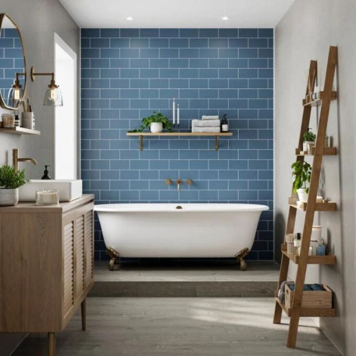 Contemporary bathroom design with vibrant blue brick tile feature