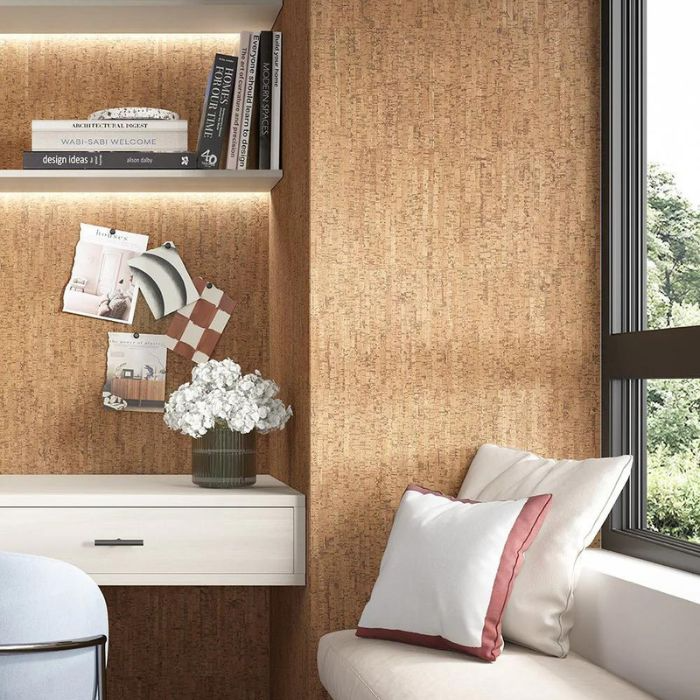 Tranquil study area featuring a desk, chair, and a view of cork wall tiles