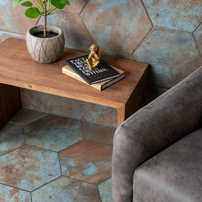 Close-up view of living room with blue and brown hexagon floor tiles