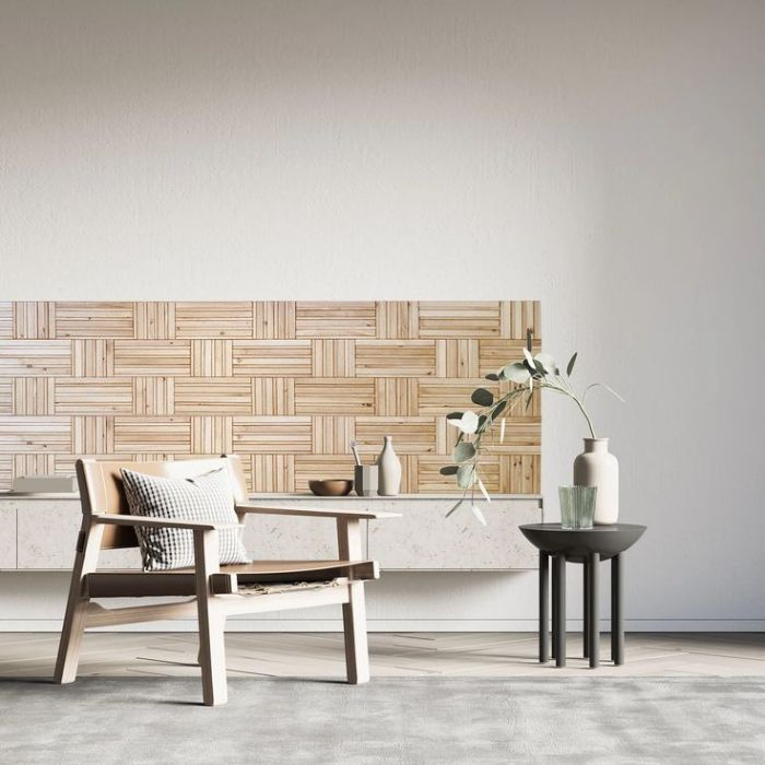 Warm living room ambiance with chic wooden accent wall and an elegant chair