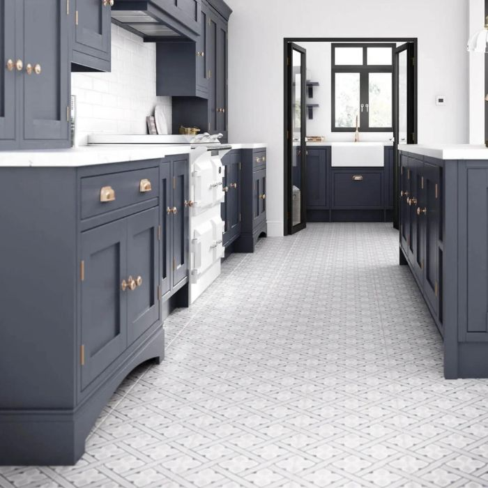 Traditional kitchen with blue and white tile floor