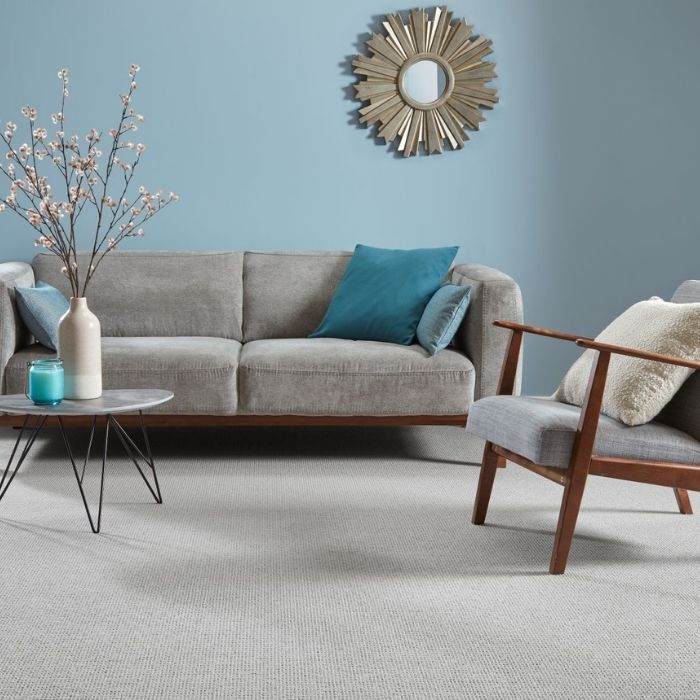 Light grey carpet in a minimalistic living room