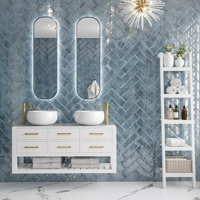 Contemporary bathroom featuring blue glossy metro tiles