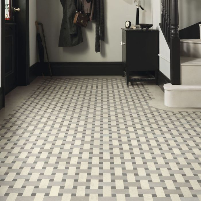 White and grey tiled flooring in a neat hallway