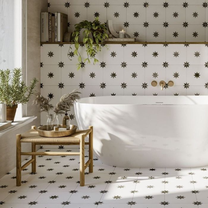 Stylish monochrome bathroom featuring intricate Moroccan-inspired tiles