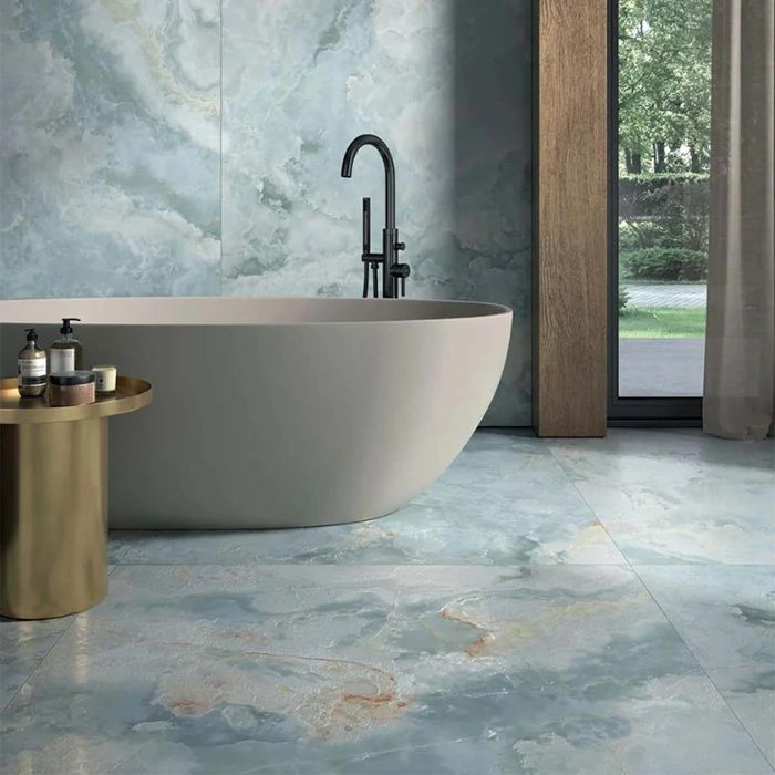 A bathroom with elegant blue marble tiles