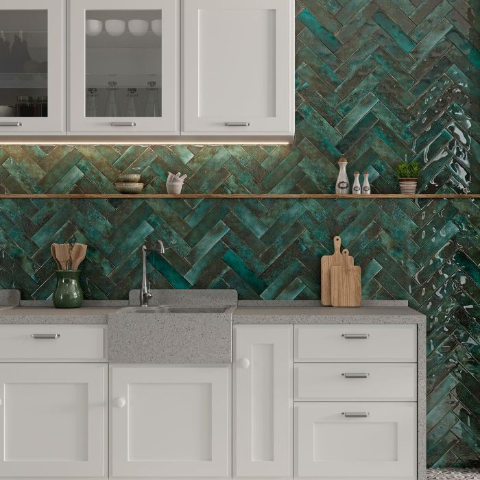 Chic kitchen with vibrant green herringbone tile backsplash