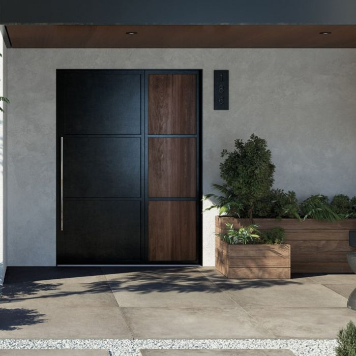 Chic black frame front door with flourishing planters, enhancing a beautifully tiled porch