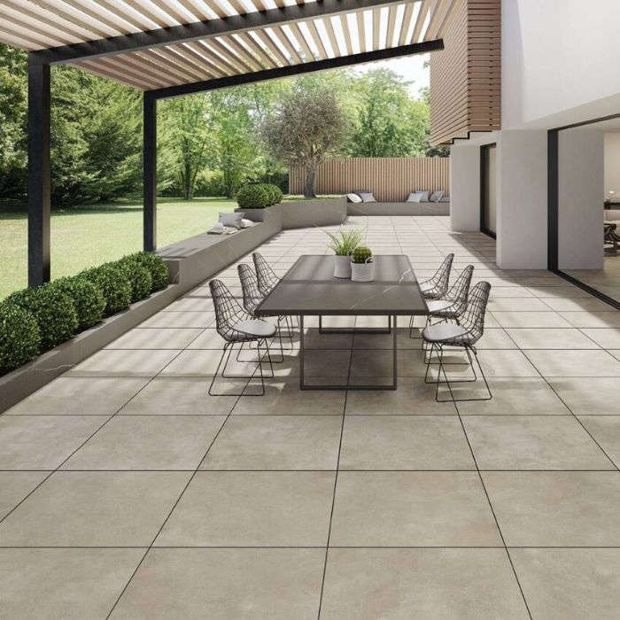 Stylish outdoor patio with modern dining set on chic tiled flooring