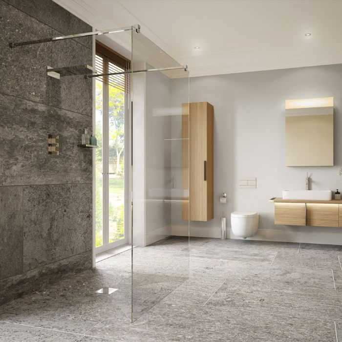 A modern glass shower complemented by elegant grey tilework