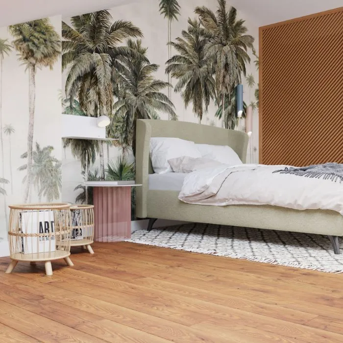 Calm bedroom setting with palm tree motifs adding a touch of nature