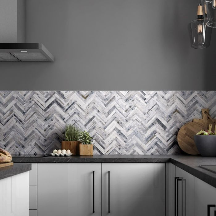 Kitchen featuring contemporary herringbone pattern tiles