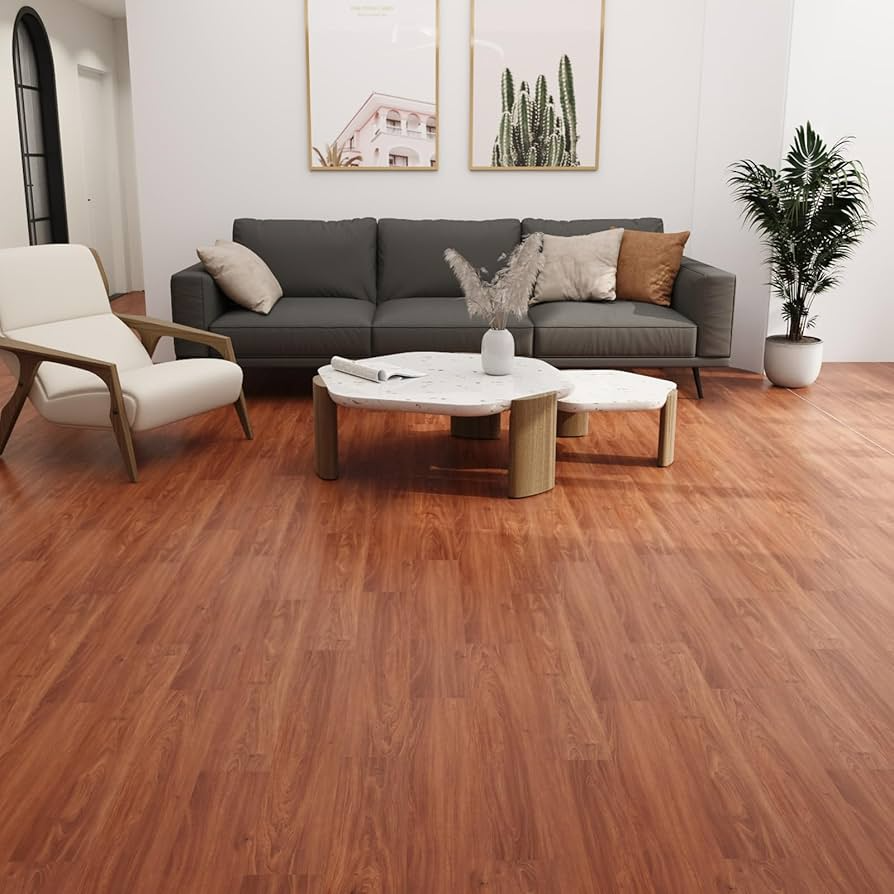 inviting living room space featuring wood-style vinyl floor tiles and a sofa