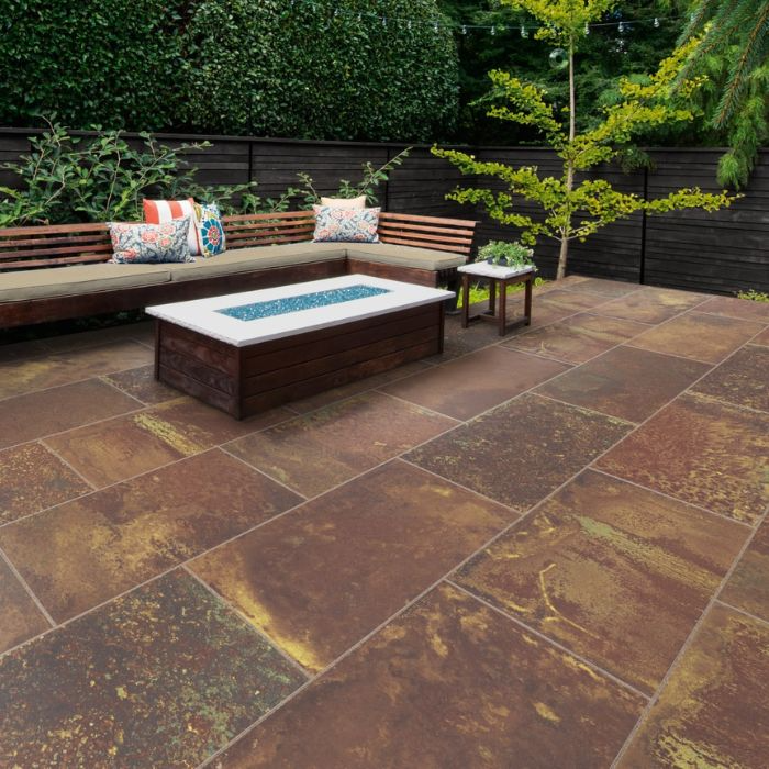 Stylish outdoor decor on a brown tiled patio