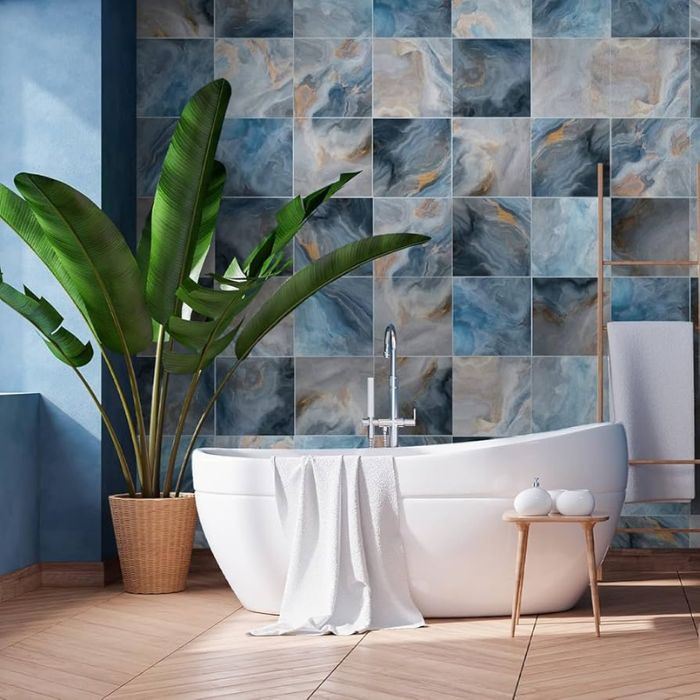 Serene bathroom setting with blue marble-effect vinyl wall tiles