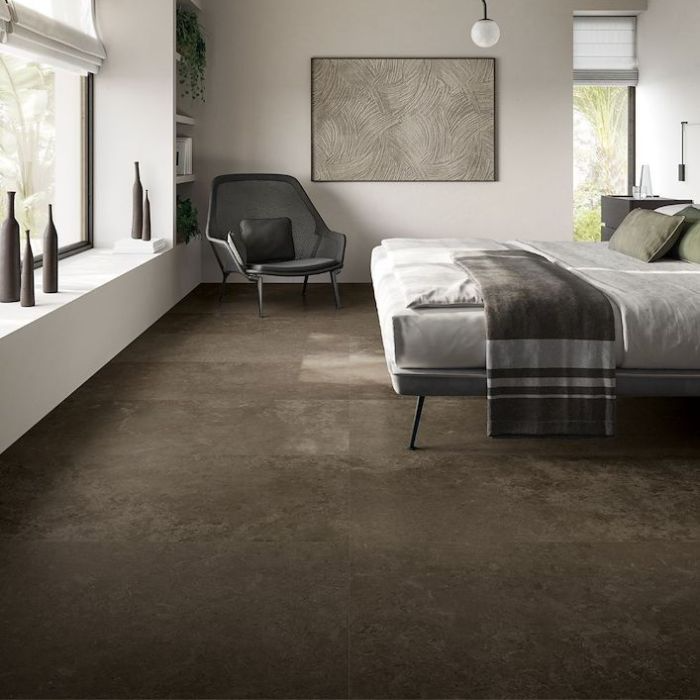 Bedroom interior featuring chic bed on beige tiles