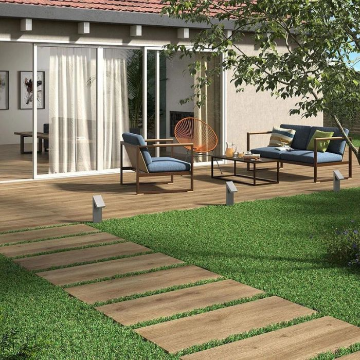 Garden area with rustic wood-effect patio tiles