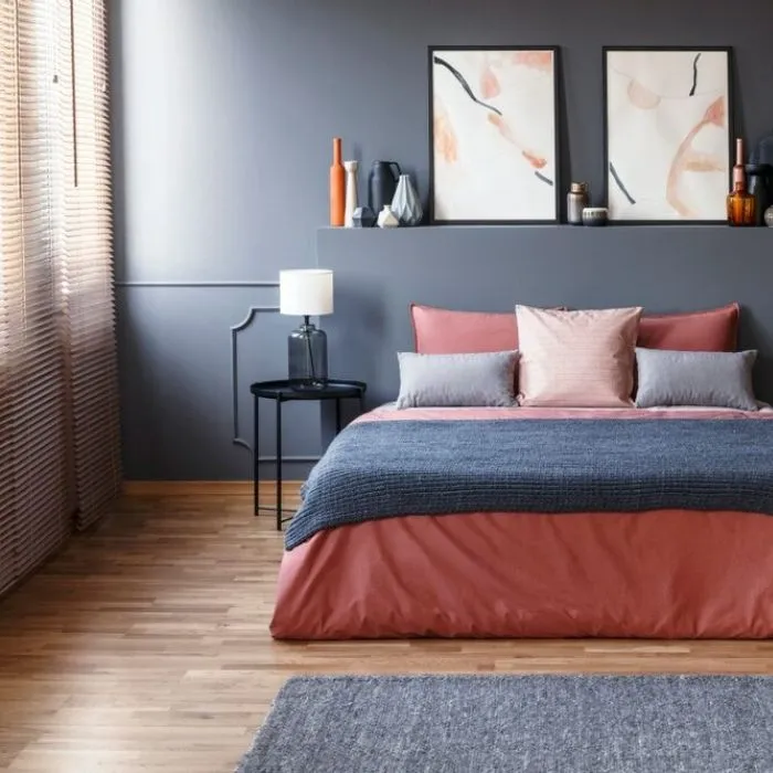 Modern bedroom decor with muted grey walls and bamboo floors