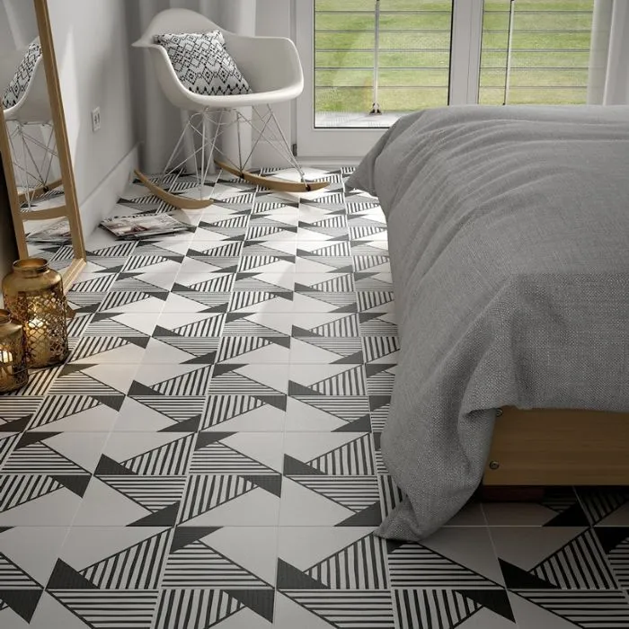 Modern bedroom featuring a monochrome tile pattern