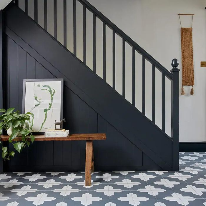 Retro tiled floor and simple wooden seating