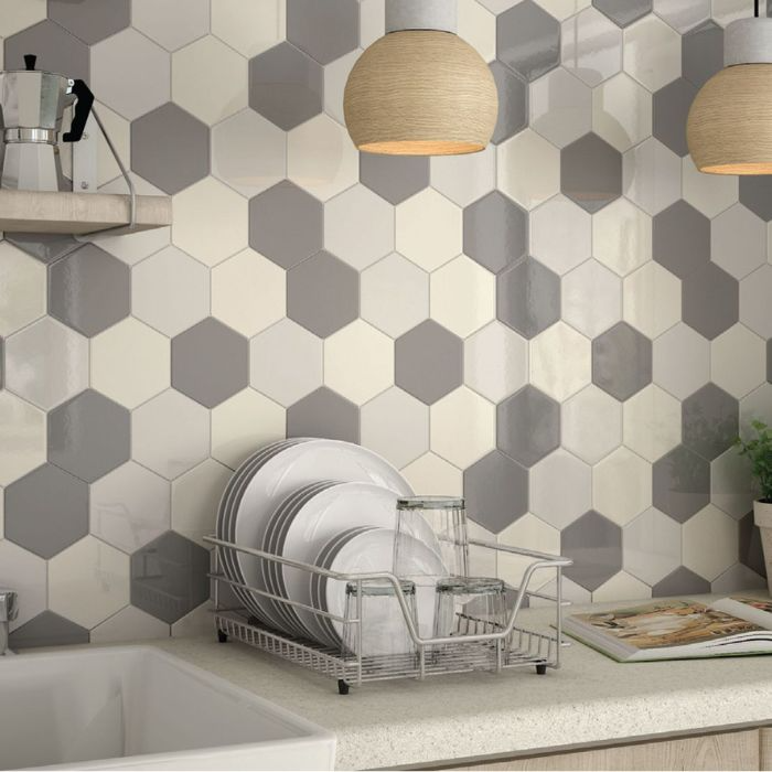 Modern kitchen with grey and white hexagon tiled wall