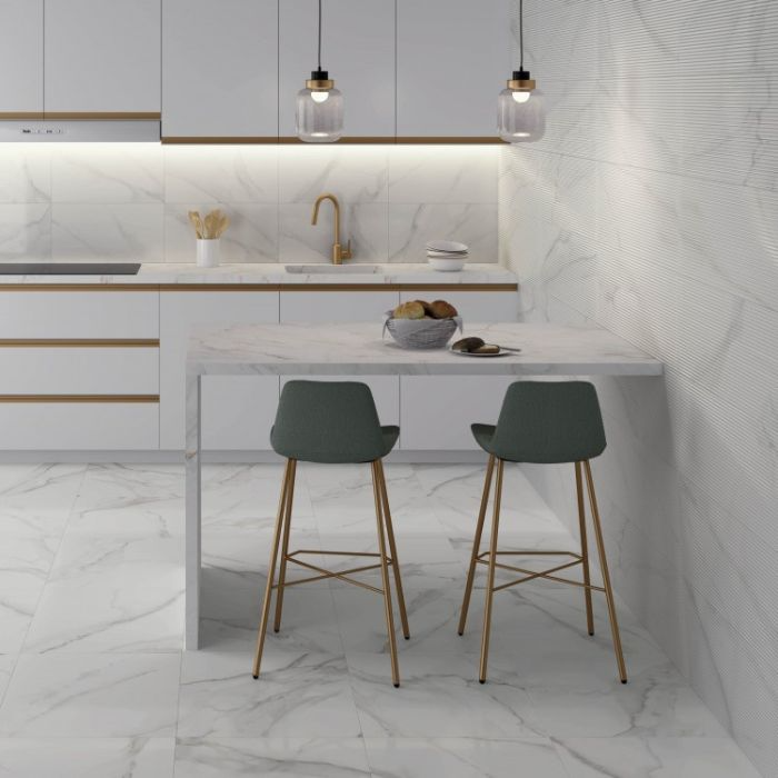 Minimalist white kitchen design showcasing polished marble tiles and counters