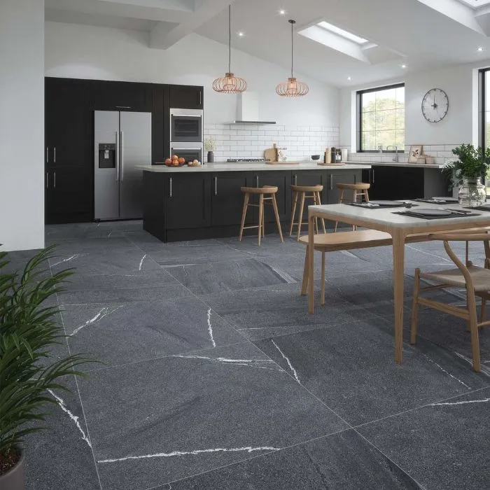 Modern kitchen featuring bold anthracite tiling