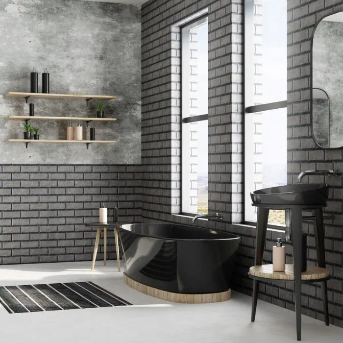 Monochrome bathroom with textured brick wall