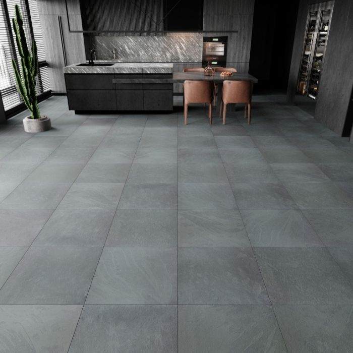 Modern kitchen with dark grey stone tiles