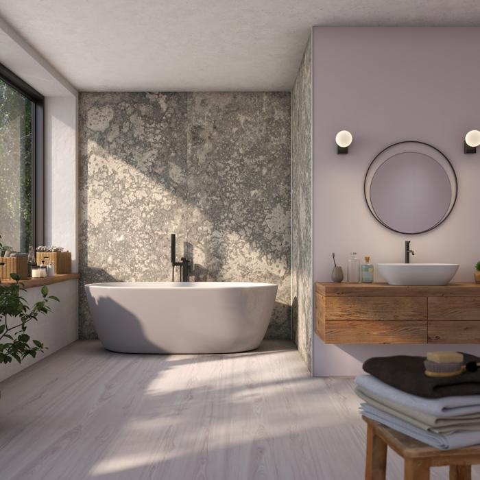 Concrete effect wall panels in a bathroom with a freestanding tub