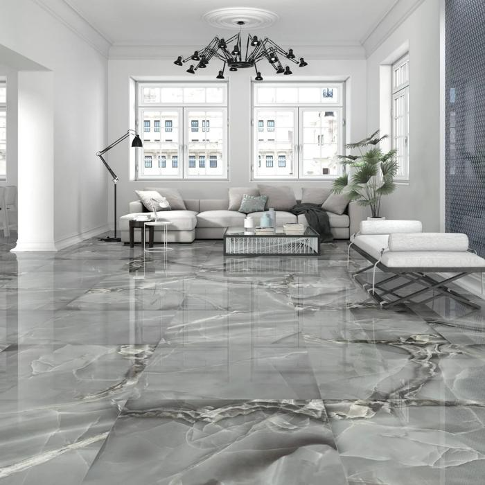 Spacious living room with grey onyx floor tiles