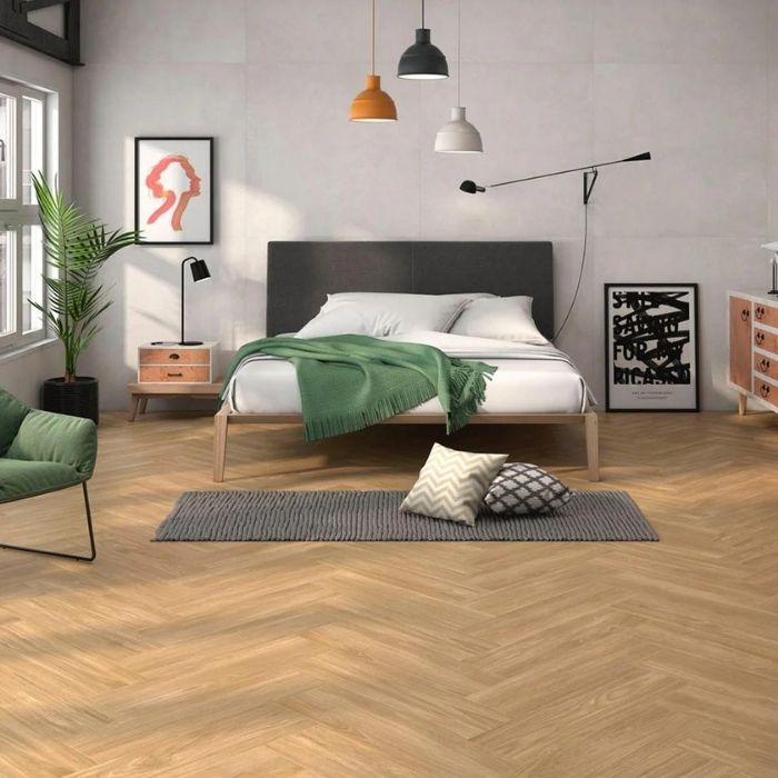 Bedroom with oak herringbone flooring and modern decor