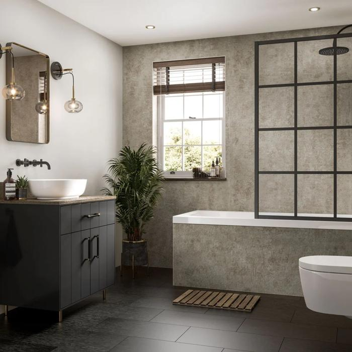 Light stone effect wall panels in a bathroom with black fixtures