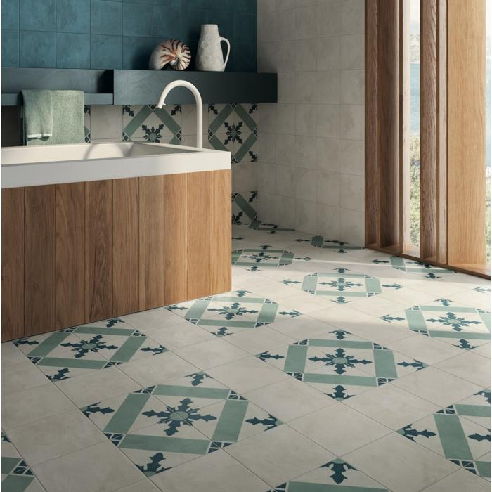 Green and white patterned tiles in bright kitchen