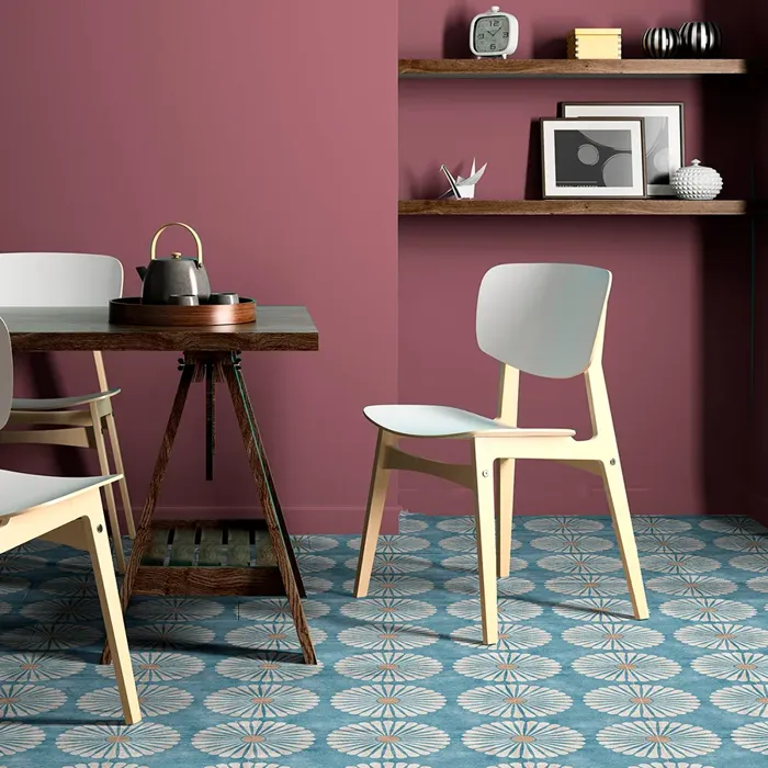 Modern kitchen featuring blue patterned tiles