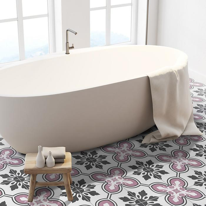 Pink and black floral tiles in modern bathroom