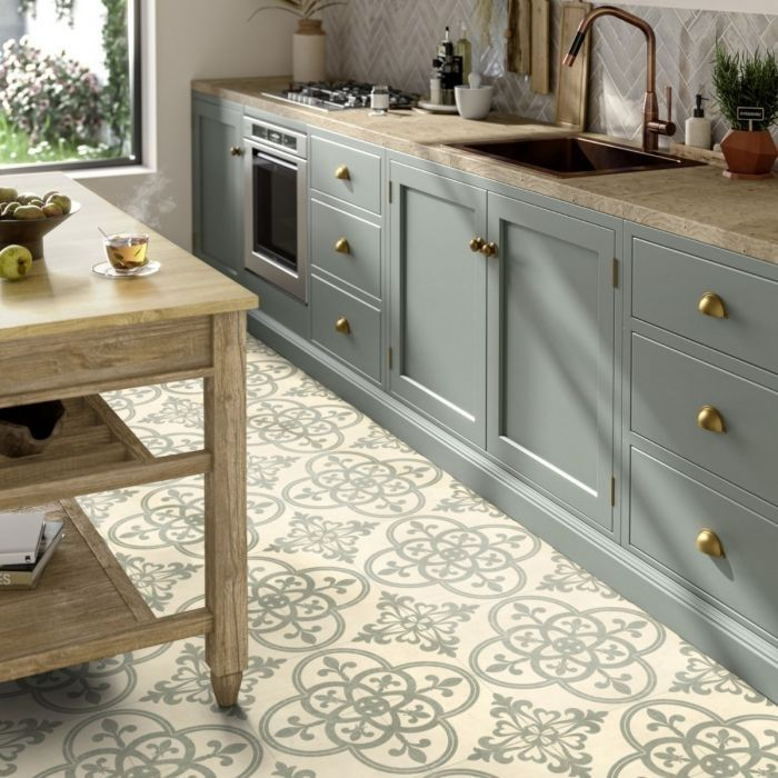 Stylish kitchen with patterned vinyl floor tiles