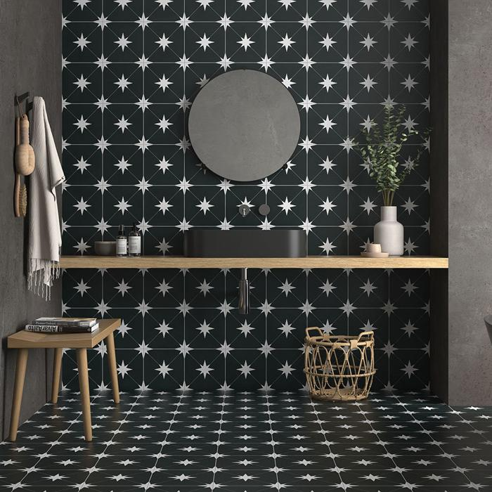 Black star-patterned tiles adorning a modern bathroom