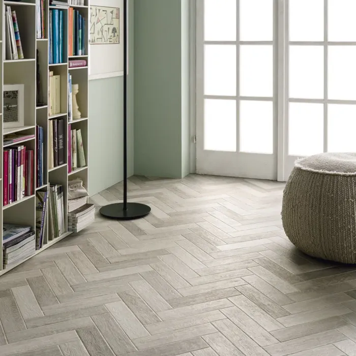 Library with light grey herringbone parquet flooring