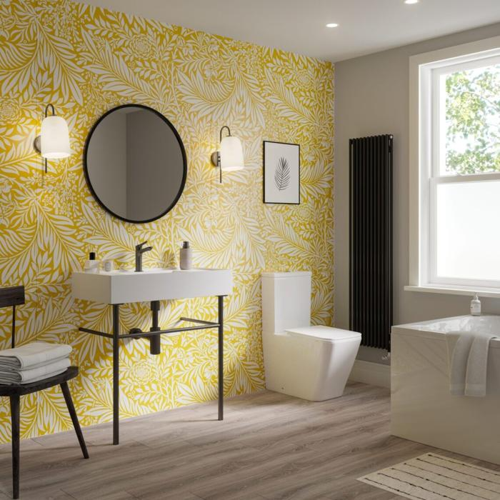 Yellow and white patterned feature wall with modern bathroom fixtures