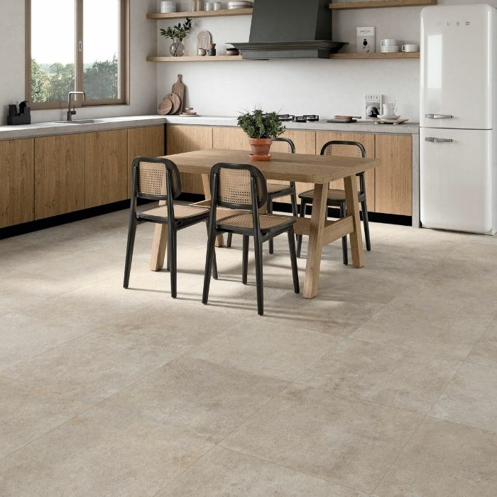 Kitchen with beige concrete floor tiles