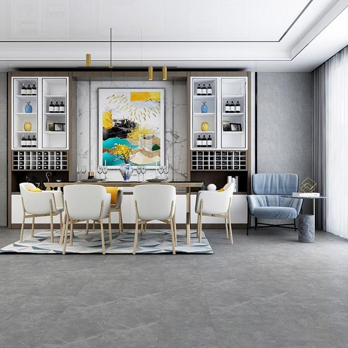 Artsy dining room with dark limestone floor tiles