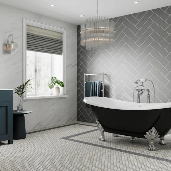 Herringbone grey tiles in a stylish bathroom