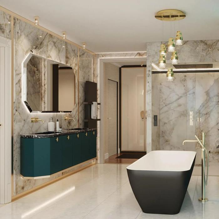 Luxurious bathroom with marble wall panels and a freestanding tub