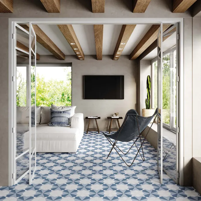 Blue geometric patterned tiles in airy living room