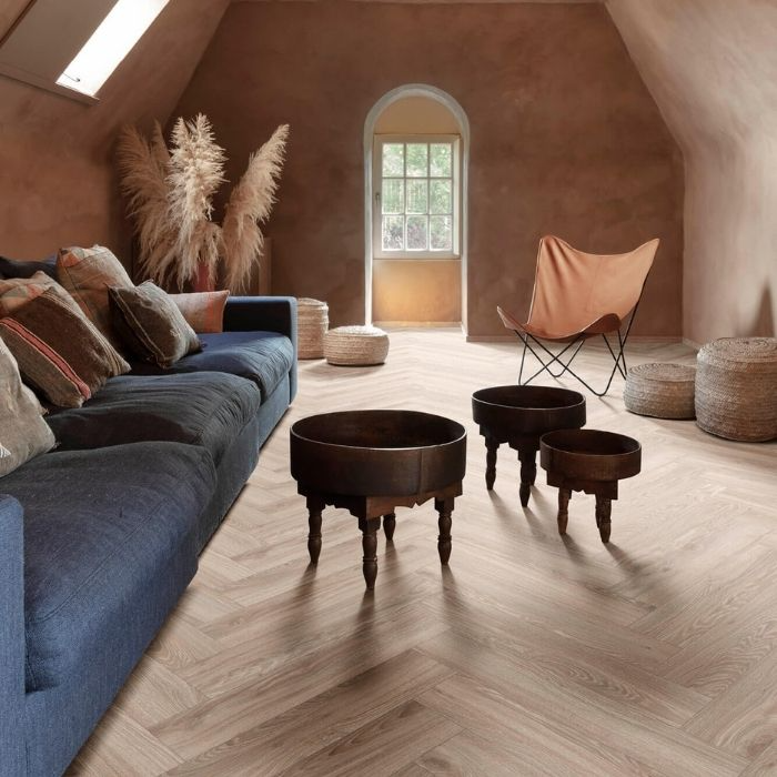 Rustic living room with light herringbone flooring