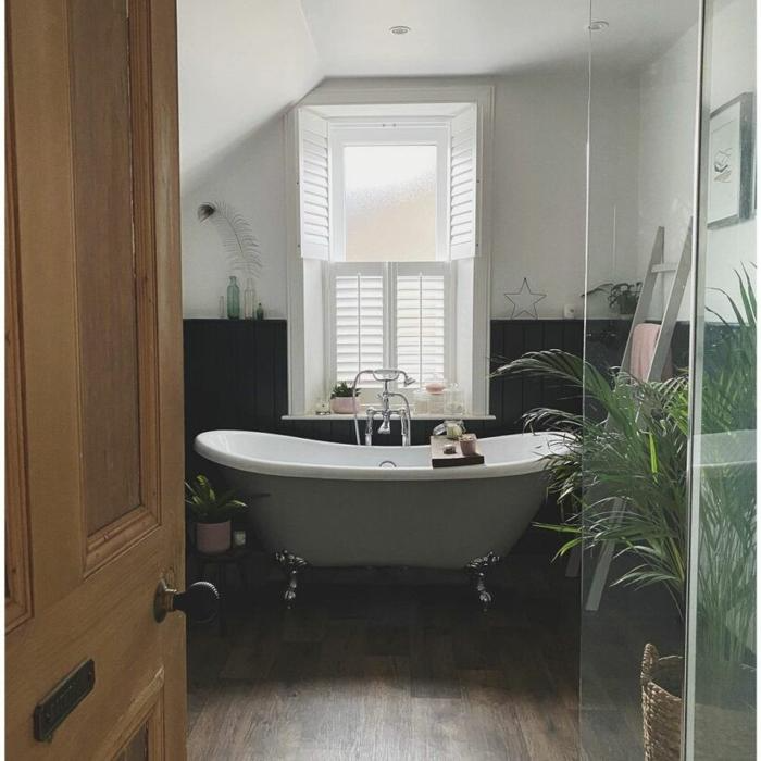 Clawfoot tub in small rustic ensuite