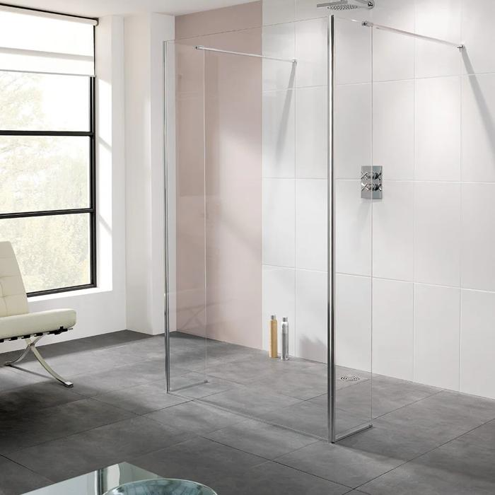 Frameless shower screen with white and grey tiles