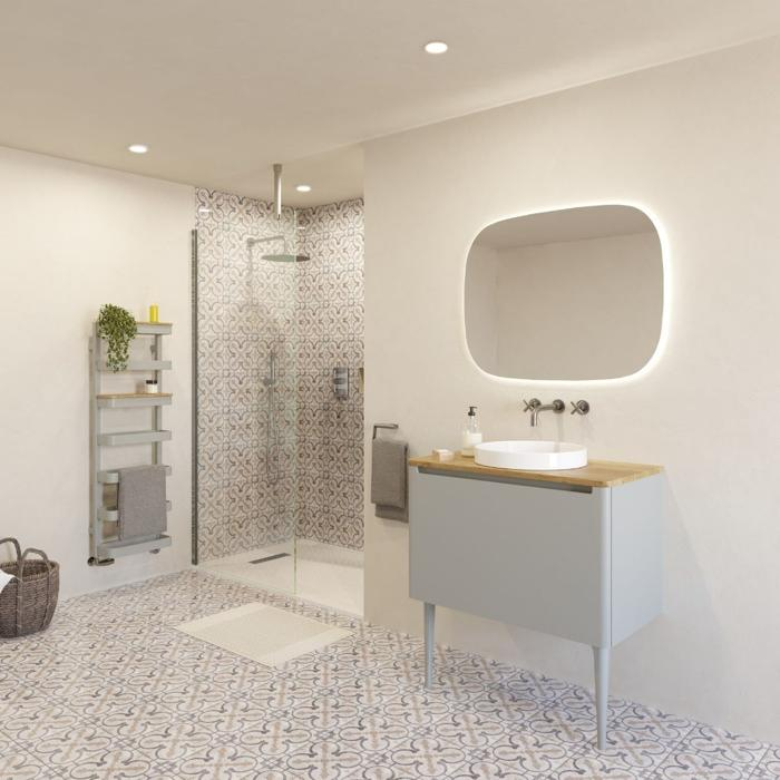 Patterned grey and white tiles in a modern bathroom