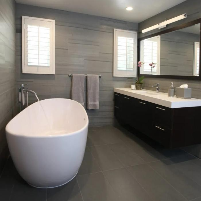 Dark grey floor tiles in a modern bathroom